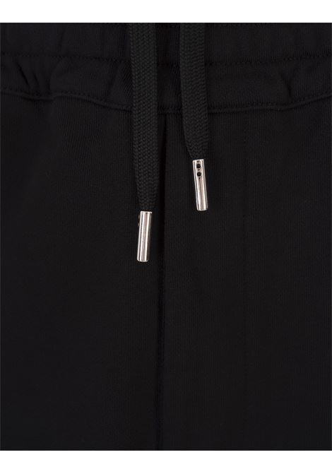 Black Joggers With Logo Tape On The Side ALEXANDER MCQUEEN | 705012-QXAAP0548