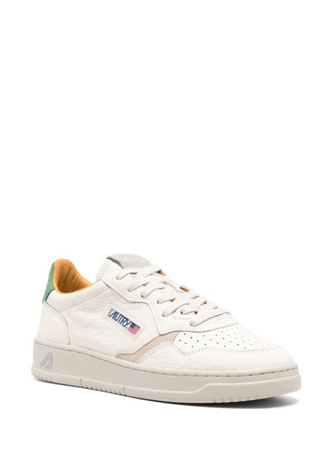 Medalist Low Sneakers In White Leather And Green Suede AUTRY | AULMLE17