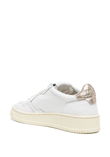 Medalist Low Sneakers In White and Gold Leather AUTRY | AULWLL06