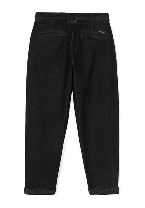 Jeans Affusolati In Denim Nero Con Pinces BALMAIN KIDS | BV6S80-Z2424921