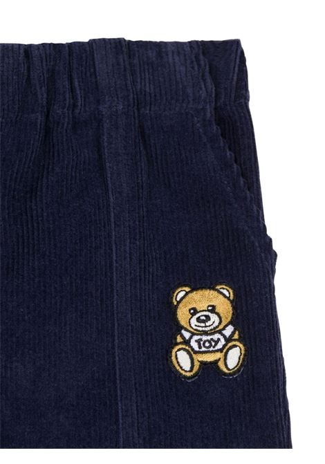 Pantaloni In Velluto a Coste Blu Con Teddy Patch MOSCHINO KIDS | MUP053LVA0540016